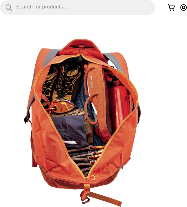 Open orange climbing backpack packed with gear
